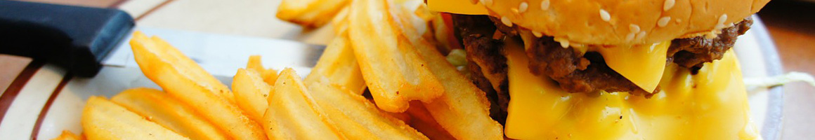 Eating Burger at Vista Drive In restaurant in Manhattan, KS.